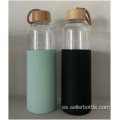 Botella de vidrio de 750 ml con cubierta de silicona y cuerda
